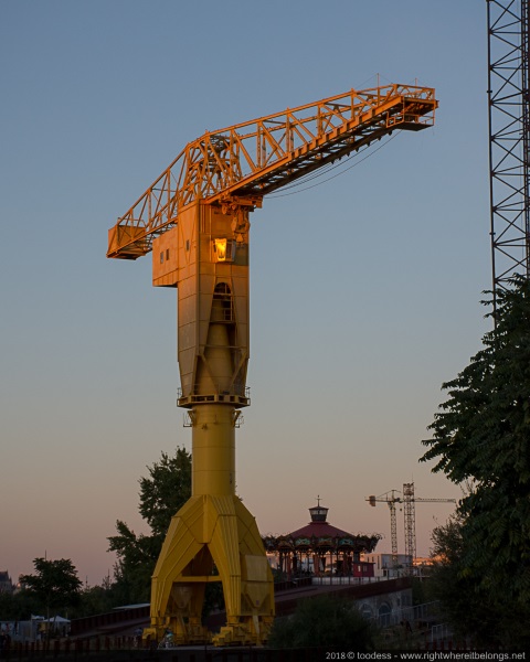 Yellow crane sunset